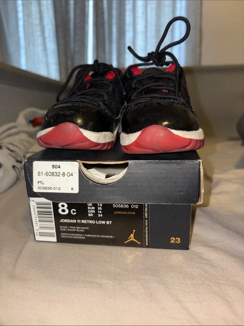 Jordan Kids Black and Red Retro Low Basketball Sneakers